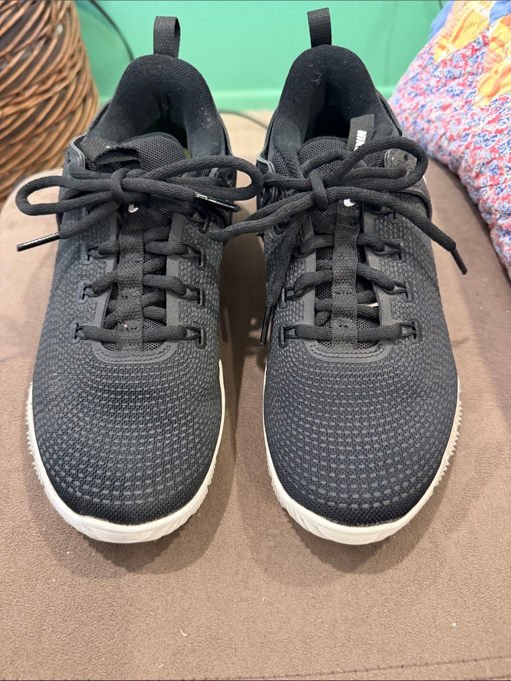 Nike Woman’s Volleyball Black Knit Lace-Up Athletic Sneakers with green sole.